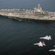 Japanese F-15s fly with American F/A-18s in the Pacific on May 30th, 2017. Photo credit: U.S. Navy
